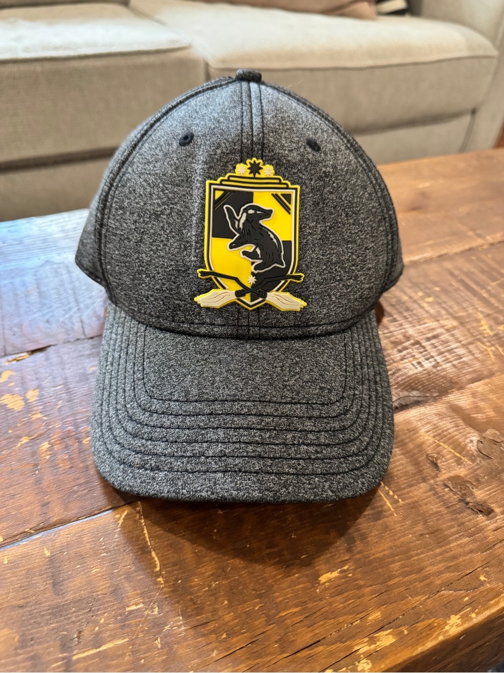 Warner Bros. Harry Potter Hufflepuff Heather Black Ball Cap w/Crest Patch